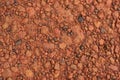 Red laterite gravel texture for background Royalty Free Stock Photo