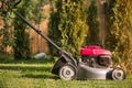 Lawn mower cutting grass Royalty Free Stock Photo