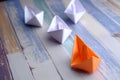 Red Leader Paper Boat Leading Group Of Paper boats Royalty Free Stock Photo