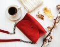 Red leather bag and cotton flowers Royalty Free Stock Photo