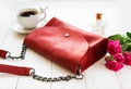 Red leather bag and flowers Royalty Free Stock Photo