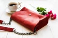 Red leather bag and flowers Royalty Free Stock Photo