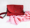 Red leather bag and scarf Royalty Free Stock Photo