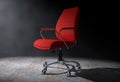 Red Leather Boss Office Chair in the Volumetric Light. 3d Render
