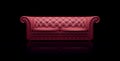 Red leather chester sofa on reflective black background