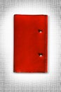 red leather cover of diary isolate is on white background