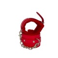 Red leather handcuffs in white background. Royalty Free Stock Photo