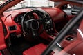 Red leather seats in car. Modern luxury sport car interior. Royalty Free Stock Photo