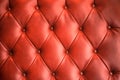 Red leather sofa texture background. Royalty Free Stock Photo
