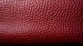 A red leather surface with cracks