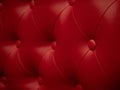 Red leather texture background with buttoned pattern Royalty Free Stock Photo