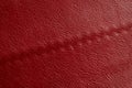 Red leather texture background. Luxury genuine textile surface material wallpaper with furniture backdrop. Close up of Royalty Free Stock Photo