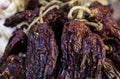 Red peppers drying in the open air Royalty Free Stock Photo