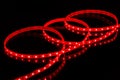 Red LED strip tape on black background Royalty Free Stock Photo