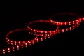 Red LED strip tape on black background Royalty Free Stock Photo