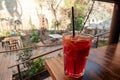 red lemonade with citrus on a wooden table in a restaurant selective focus Royalty Free Stock Photo