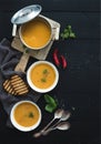 Red lentil soup with spices, herbs, bread in a Royalty Free Stock Photo