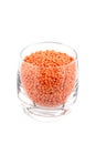 Red lentils in glass, white background Royalty Free Stock Photo
