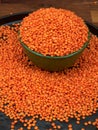 Red lentils in a green ceramic bowl Royalty Free Stock Photo