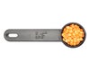 Red lentils on measuring spoon and white background Royalty Free Stock Photo