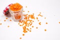 Red lentils in a glass jar, on a white background Royalty Free Stock Photo