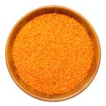 Red lentils in wooden bowl Royalty Free Stock Photo