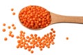 red lentils in wooden spoon isolated on white background. Top view Royalty Free Stock Photo