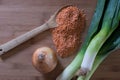 Red Lentils on Wooden Spoon with Leeks and A Sweet Onion