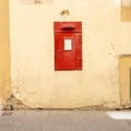 Red letterbox in Valletta, Malta