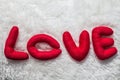 Red letters written word love.