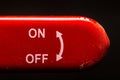 the red lever on off switch dark background Royalty Free Stock Photo