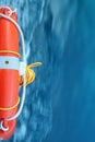 Red Lifebuoy with blue sea water Royalty Free Stock Photo