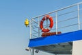 Red lifebuoy on ferry deck Royalty Free Stock Photo