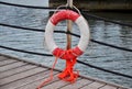 Red Lifebuoy in front of the blue sea Royalty Free Stock Photo