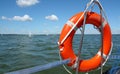 Red lifebuoy on yacht Royalty Free Stock Photo