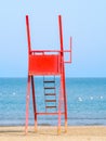 Red lifeguard chair on an empty beach Royalty Free Stock Photo