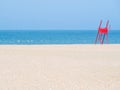 Red lifeguard chair on an empty beach Royalty Free Stock Photo