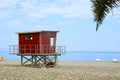 Red lifeguard hut on the empty beach Royalty Free Stock Photo