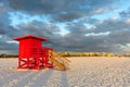 Red Lifeguard Tower Under Dramatic Sky Royalty Free Stock Photo
