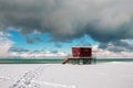 Red lifeguard tower at winter Royalty Free Stock Photo