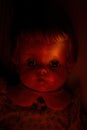 Red light on antique doll