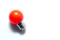 Red light bulb isolated on white background. Royalty Free Stock Photo