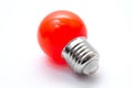 Red light bulb isolated on white background. Royalty Free Stock Photo