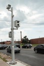 red light camera picture and video two cameras on silver post with all dark cars. p Royalty Free Stock Photo