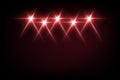 Red light from projectors on black background. Spotlight with beams effect on stage vector illustration. Abstract bright Royalty Free Stock Photo