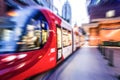 Red light rail train in close up, image in zoom-blur effect for background. Royalty Free Stock Photo
