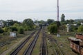 Red light signal on a railway fork, railway tracks