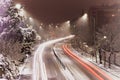 Red light trail on a wintertime road in Cosenza, Calabria, Italy