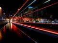 Light trails of the fast driving bus at the night city of Brisbane, Australia