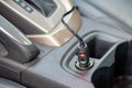 Red light on a 12V plug in an automotive cigarette lighter Royalty Free Stock Photo